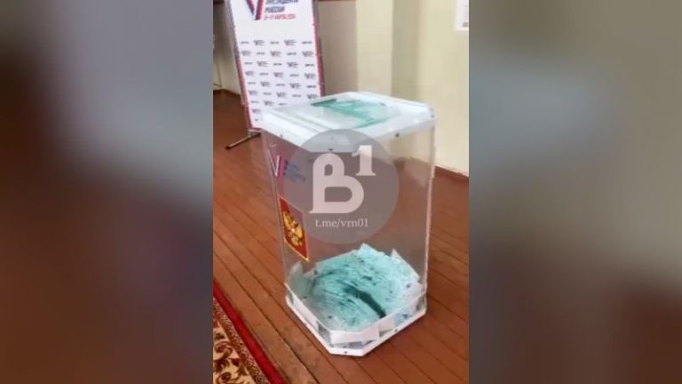 Russia opens criminal cases after protesters pour dye in ballot boxes and start fires with voting underway