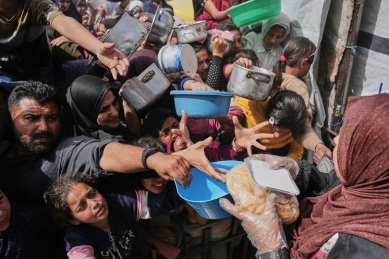 A US-backed group says it will deliver aid to Gaza, but humanitarian organizations are skeptical. Here’s what we know