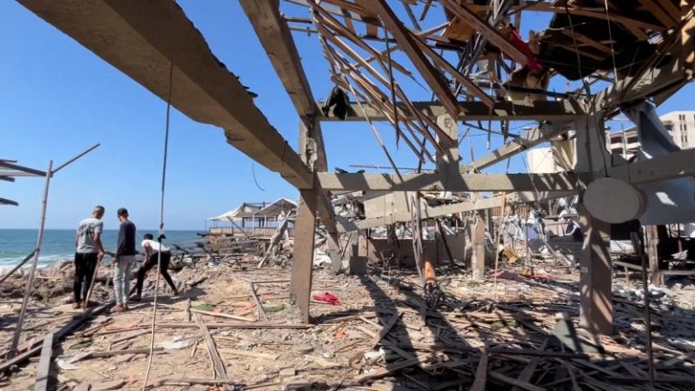 Israeli strike on cafe near Gaza City port kills dozens, hospital official says